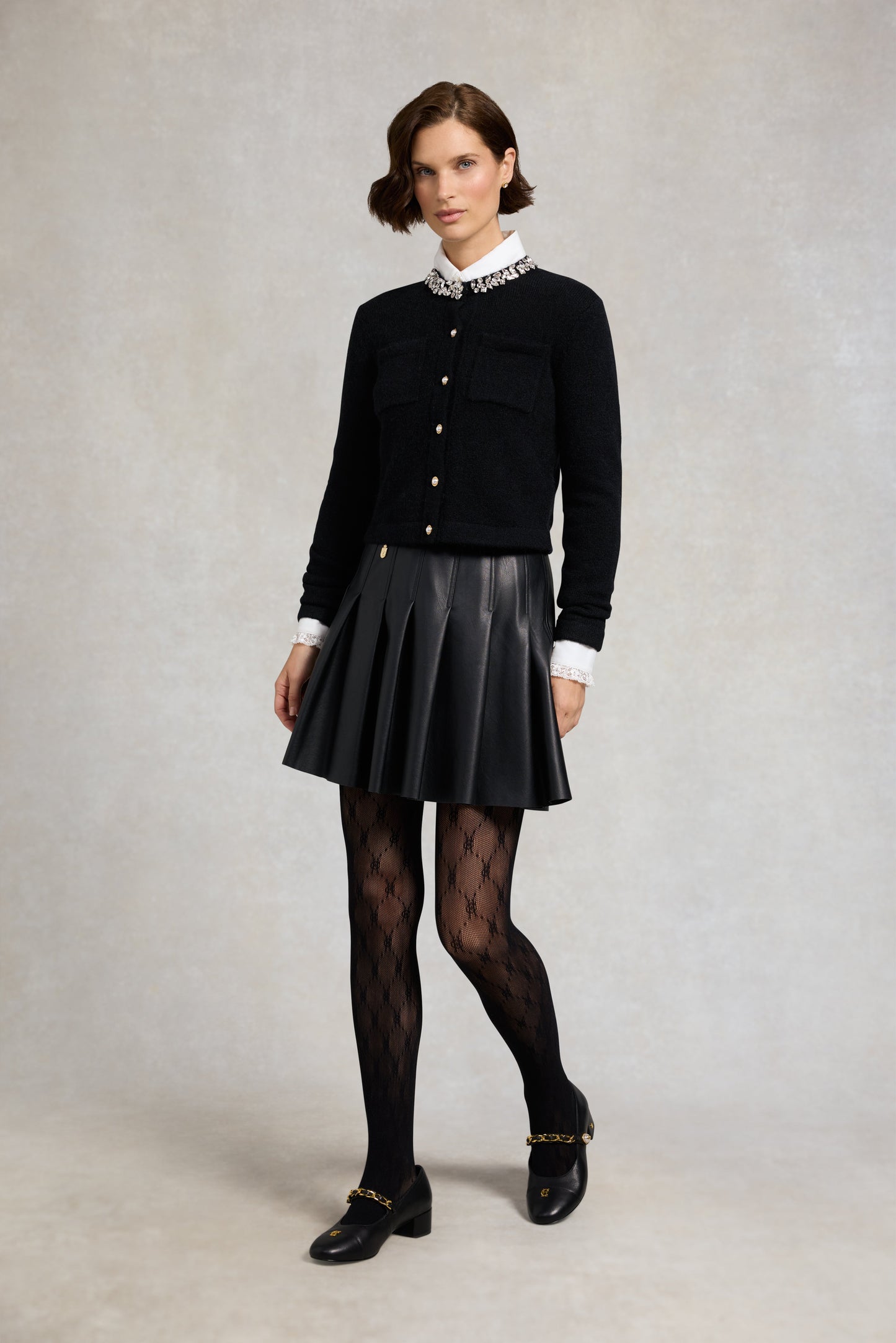 Faux Leather Pleated Mini Skirt (Black)